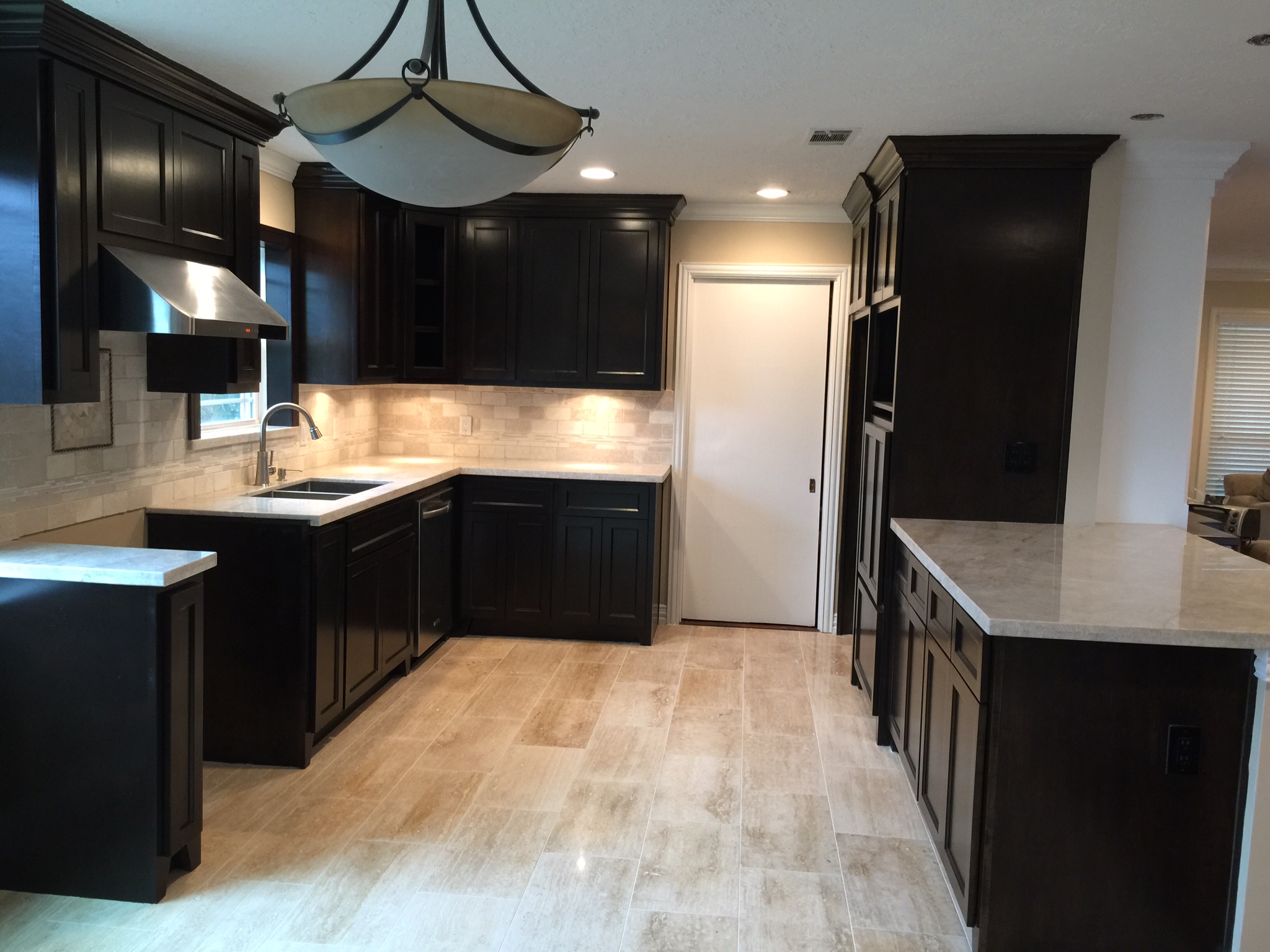Kitchen with Remodeled floors, cabinets, counter tops and appliances