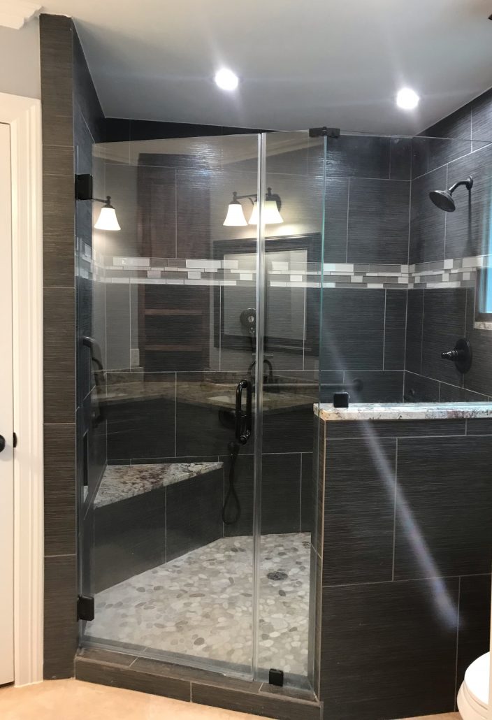 A recently renovated bath using ada-compliant grab and pull bars